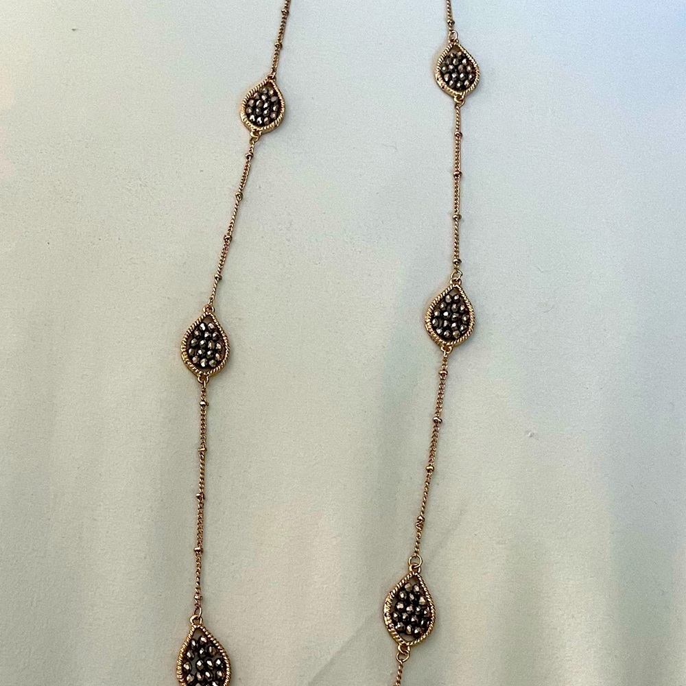 Gold tone long necklace adjustable